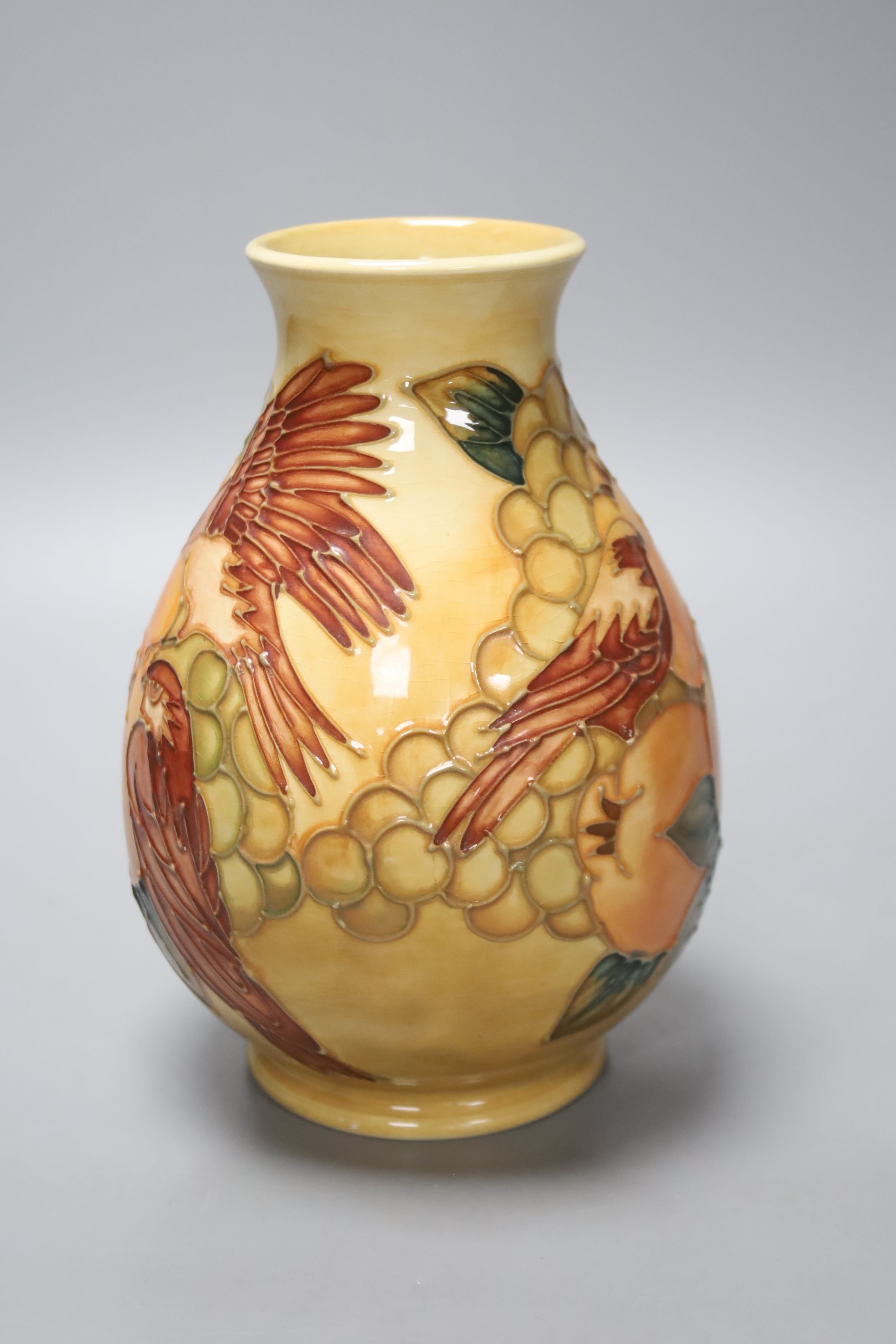 A small Moorcroft vase - Peach and Finch pattern